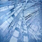 Abstract oil painting by Cynthia McLoughlin in silver and blues.