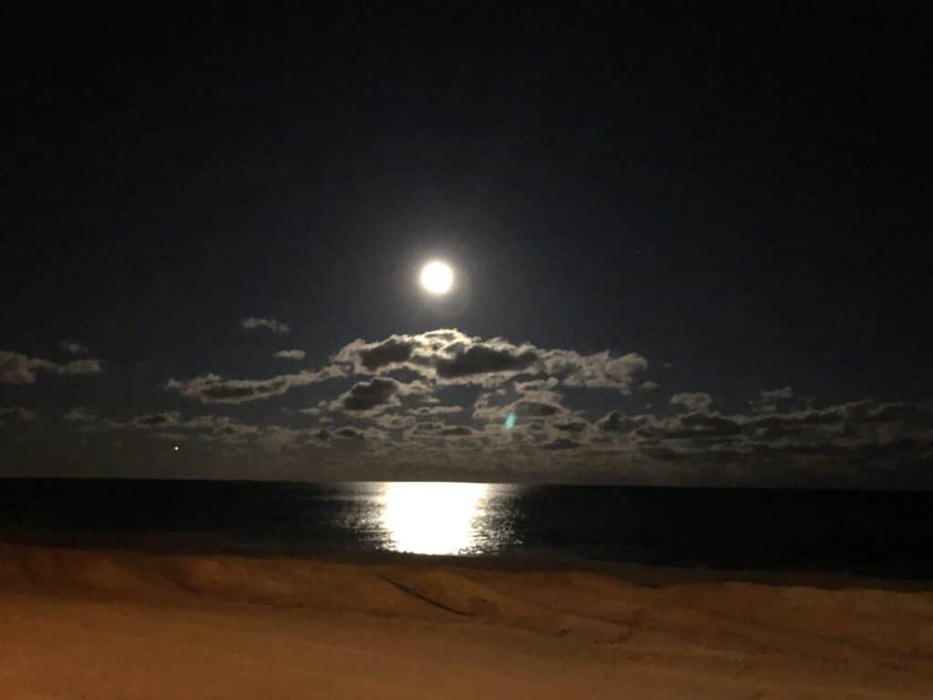 Photo of the moon over the ocean/beach in NJ by Cynthia McLoughlin