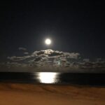 Photo of the moon over the ocean/beach in NJ by Cynthia McLo