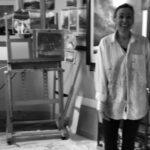 Black and white photo of Cynthia McLoughlin in her studio.
