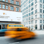 photo of the Sean Kelly Gallery in New York City with a cab speeding by on 36th Street in Manhattan