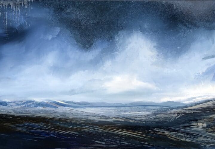 Deep blue storm clouds drift over the valley and distant mountains, deep shadows in the foreground create more drama in this horizontal oil painting by artist Cynthia McLoughlin.