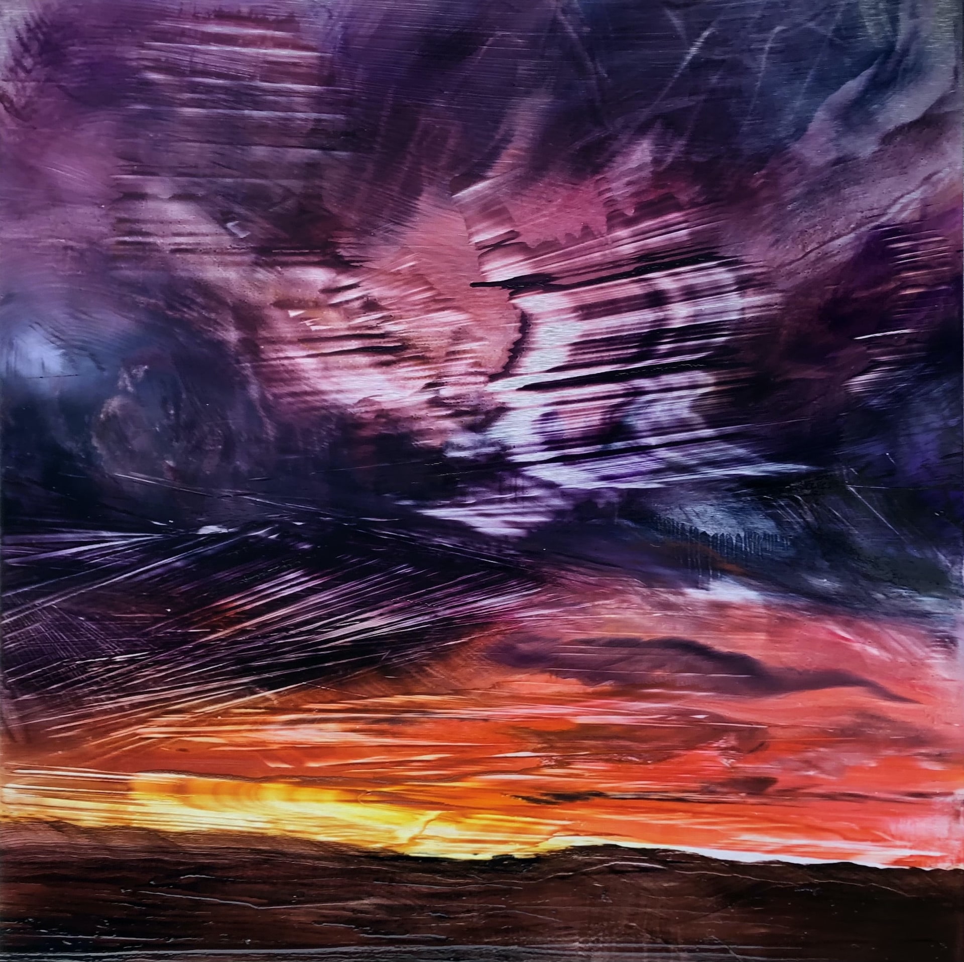 An original oil painting on metal panel by artist Cynthia McLoughlin of a flaming, dramatic sunset.