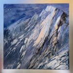 A contemporary mountain oil painting on metal panel by artist Cynthia McLoughlin