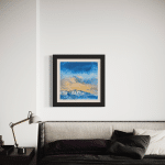 Framed 28 inch contemporary abstract mountain painting "Last Run" installed above a minimalist bedroom headboard, creating a focal point for modern luxury home decor.