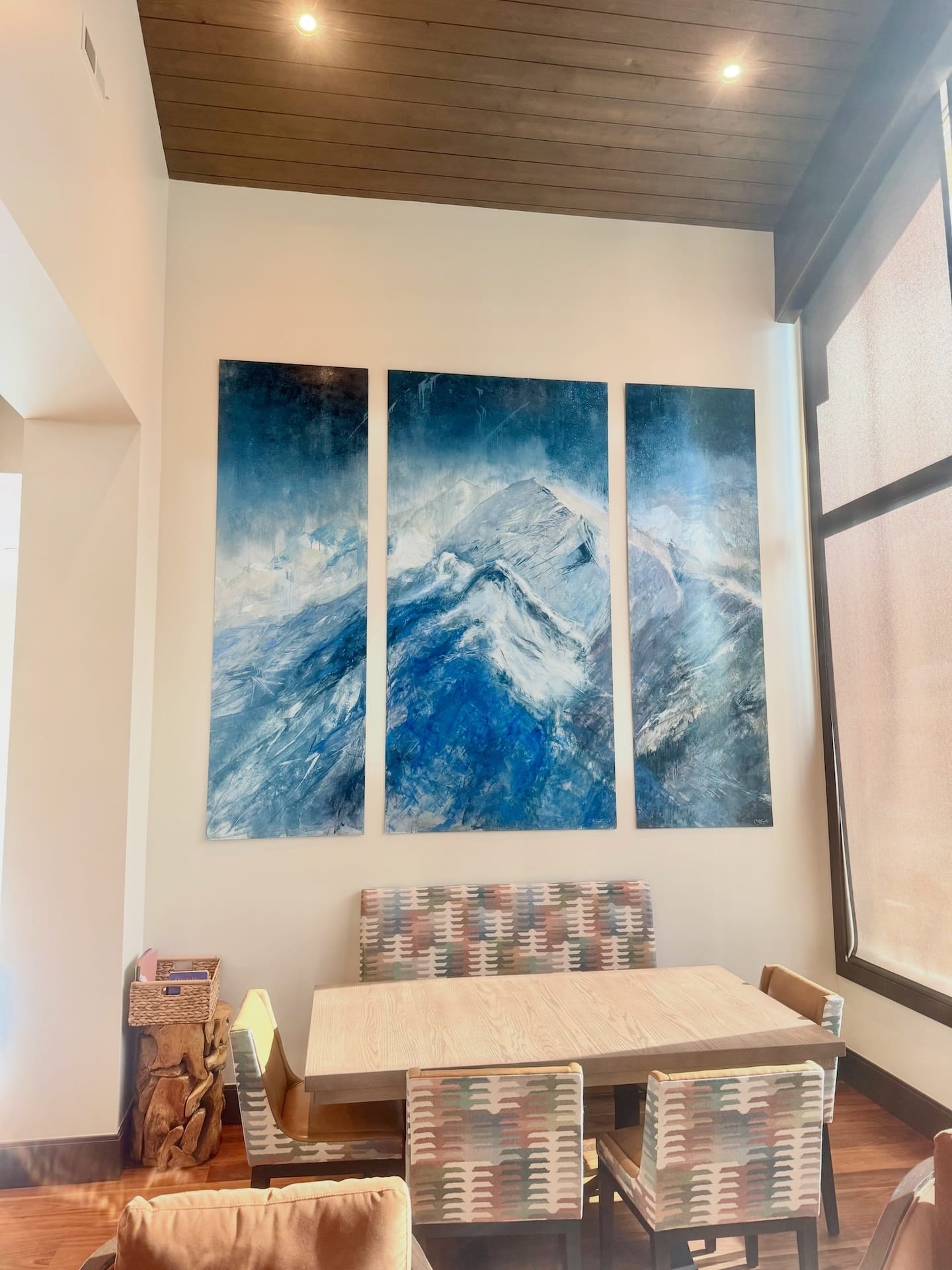 Triptych Celestial Drift with luminous mounmtain peaks and atmospheric sky in its forever Deer Valley home.
